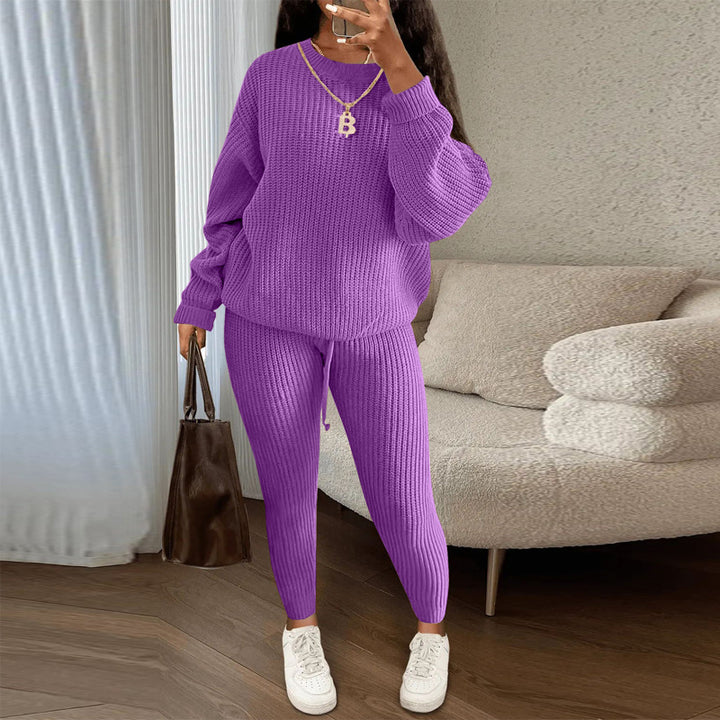 Woman in ribbed knit jumper and trousers set