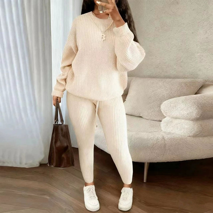 Woman in ribbed knit jumper and trousers set